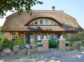 Kapitäns Hus - Haushälfte 01 mit Kamin, Sauna, Wasserblick